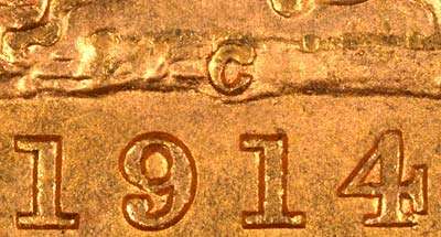 1914 George V Sovereign - Struck at the Ottawa mint in Canada, the mint mark C is found in the ground above the year date on the reverse